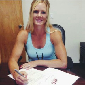 Holly Holm signing her UFC Contract 