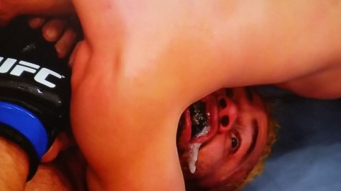 Jake Ellenberger has the North South Choke on Tight on Josh Koscheck UFC 184