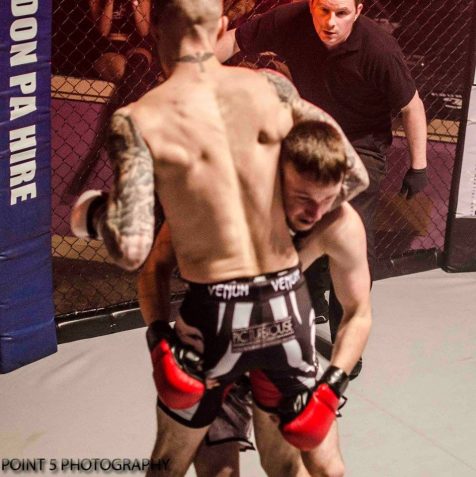 Adam Little putting Reece Pearson to sleep via Standing Guillotine at RAGED UK MMA (c) Point 5 Photography