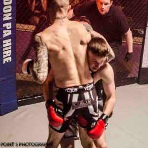 Adam Little putting Reece Pearson to sleep via Standing Guillotine at RAGED UK MMA (c) Point 5 Photography