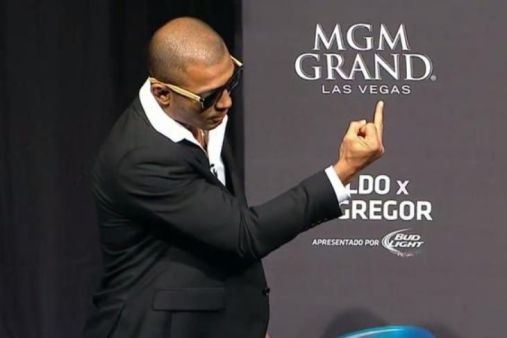 Jose Aldo Jnr Flipping The Bird at Conor McGregor on the UFC 189 world tour press conference