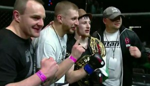 Brett Johns and his Team after winning The Bantamweight Championship Belt at Titan FC 33 